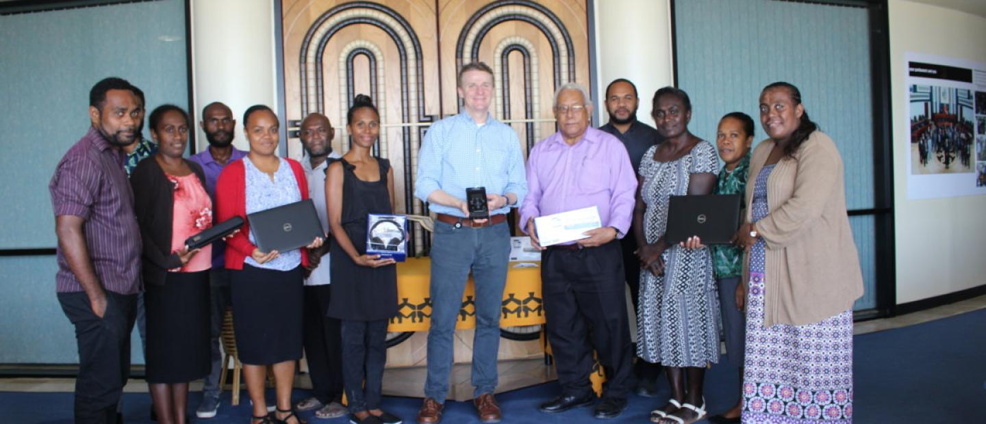 HE. Roderick Brazier (center) and staff of the National Parliament Office during the short handing over ceremony at the National Parliament House, Honiara.